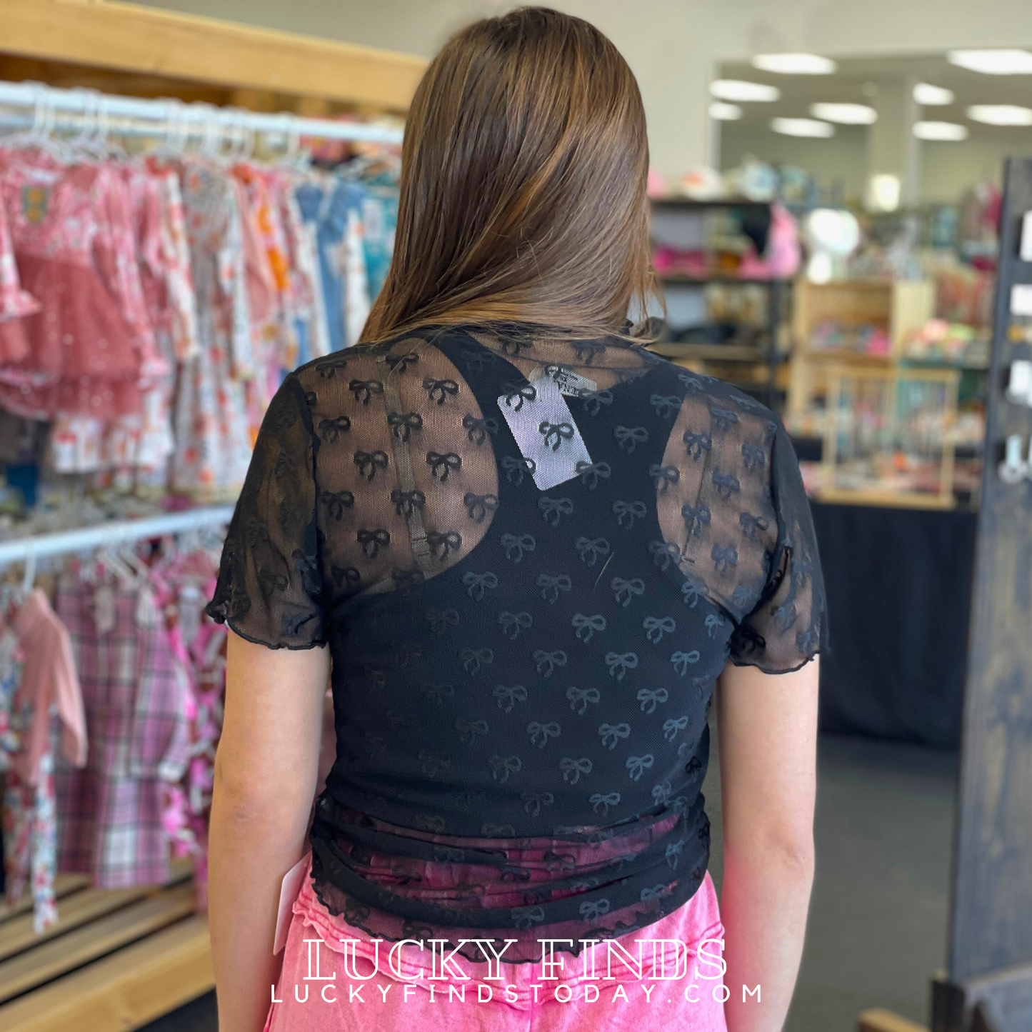 It's the Bow Mesh Top D1472