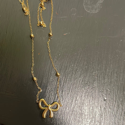 Gold bow necklace JC242