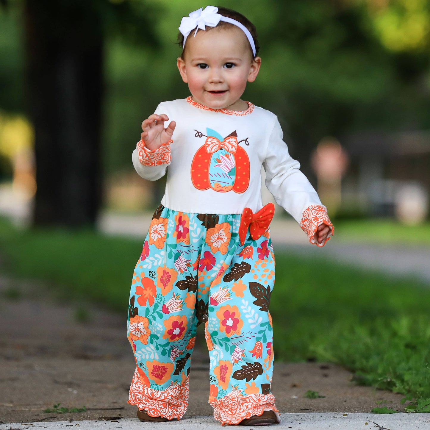 K101  Floral Pumpkin Romper