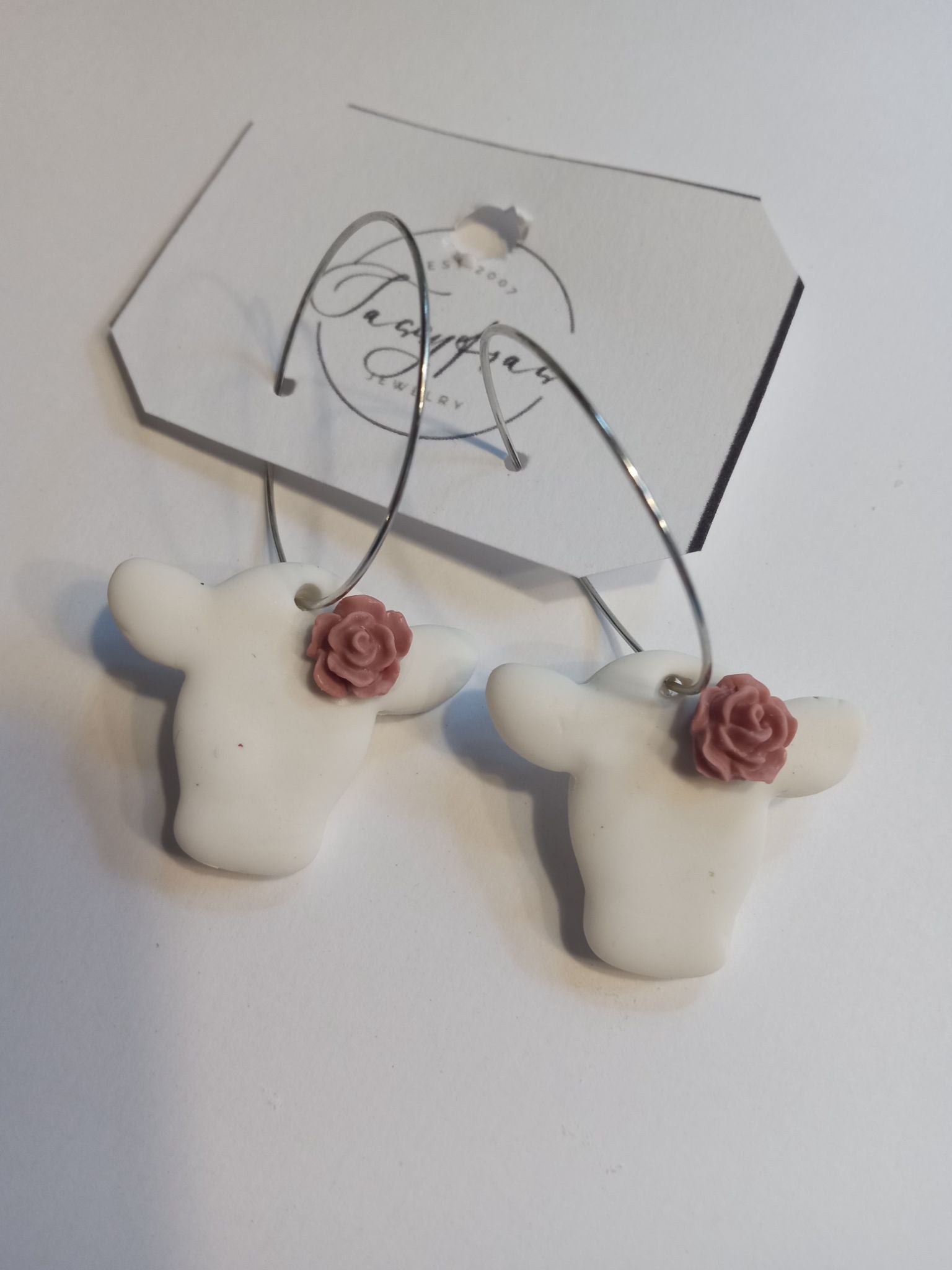 White cow hoop earrings  - 1